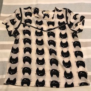 Supper cute blouse with black cats prints.